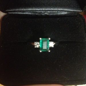 Real Emerald and Diamonds set in White Gold ring.